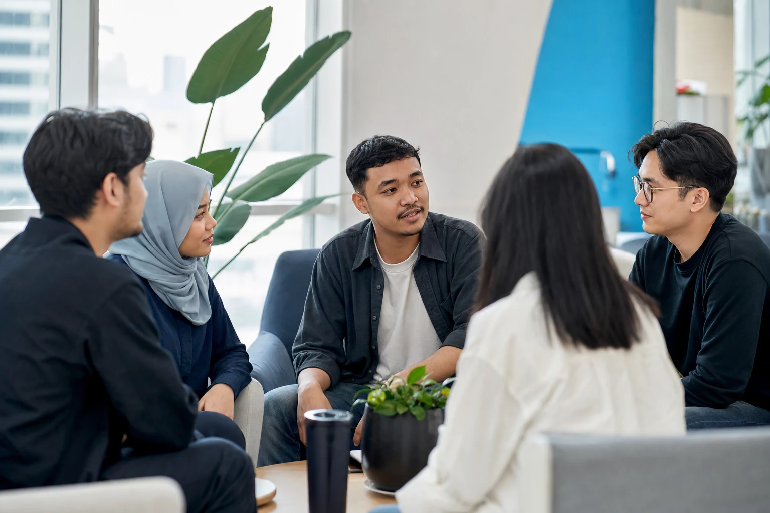 Team discussion in the office lounge